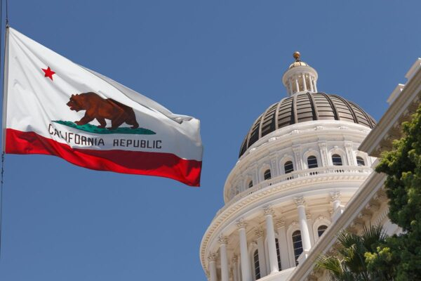 California state flag with capital background