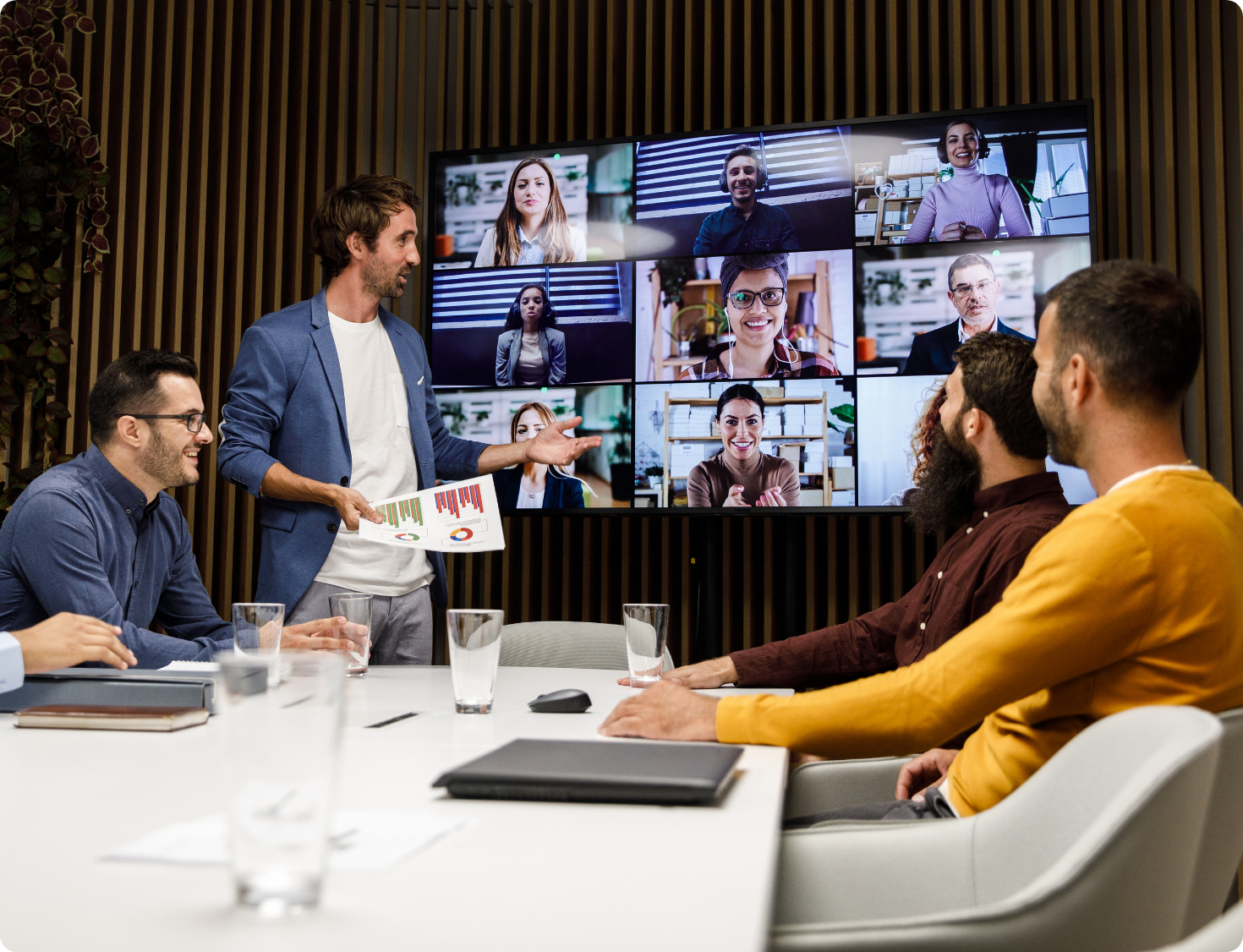 Hybrid team holding video conference meeting